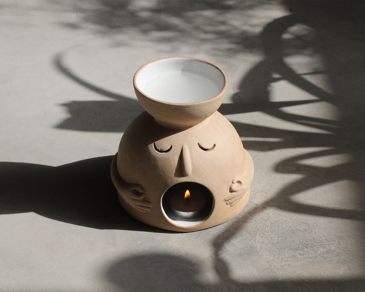 Enlightened Bowl Head: Handcrafted Sculptures by Claymen