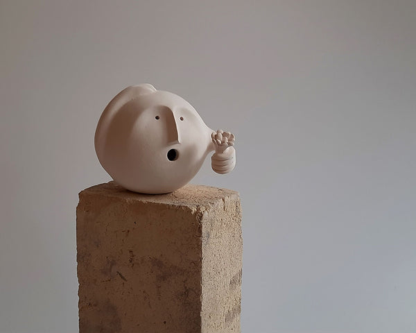 Well-Wisher Clayhead